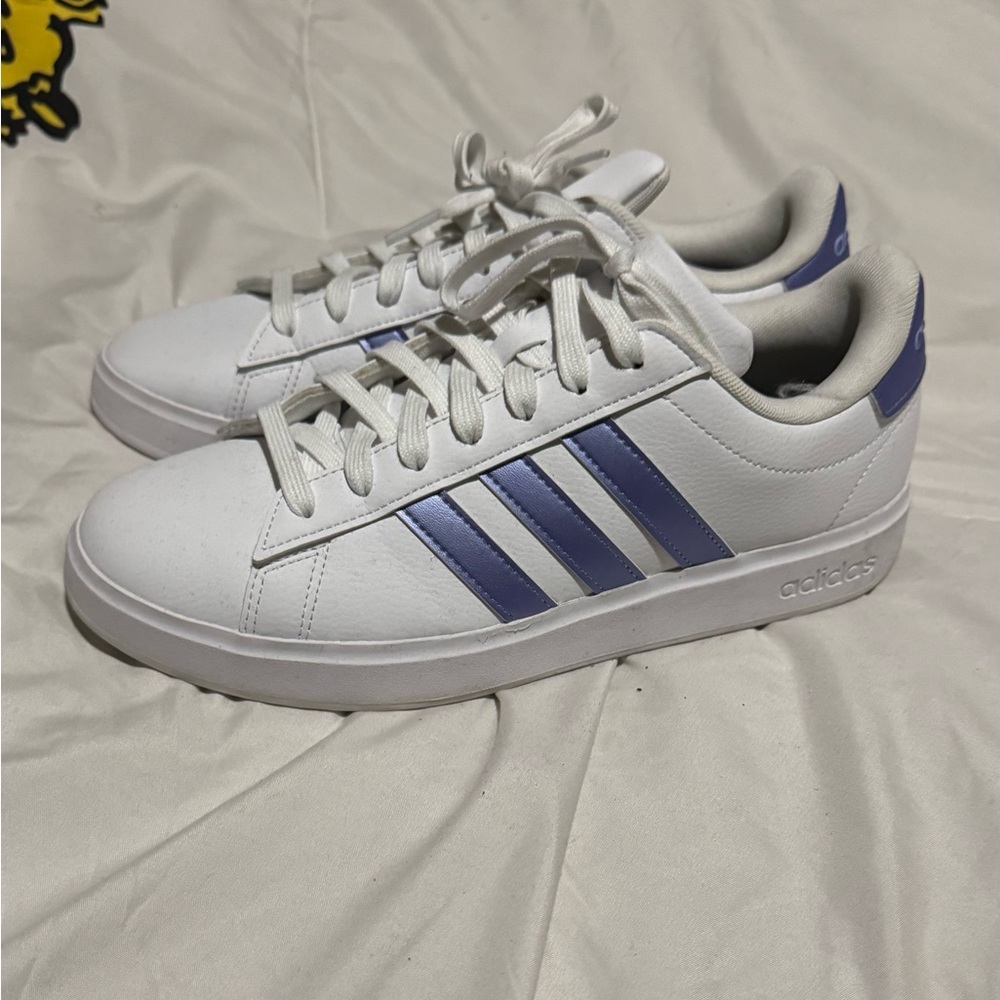 Adidas women’s White Sneakers with purple Stripes size 9